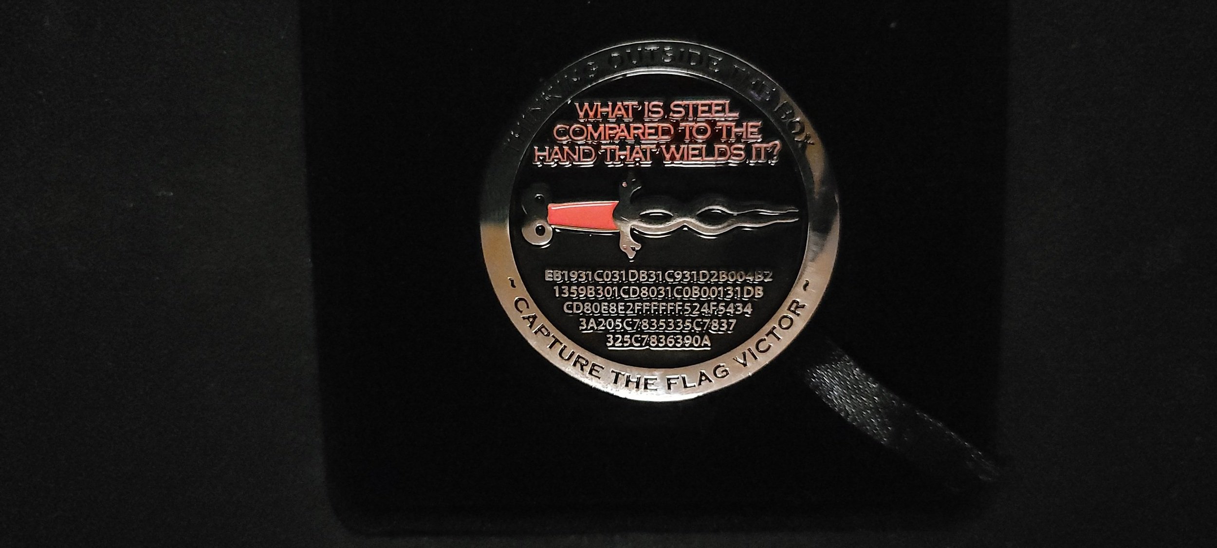 Back of the challenge coin